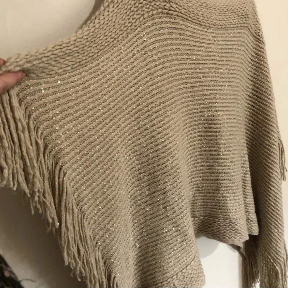 Tan knitted metallic gold fringe hem poncho